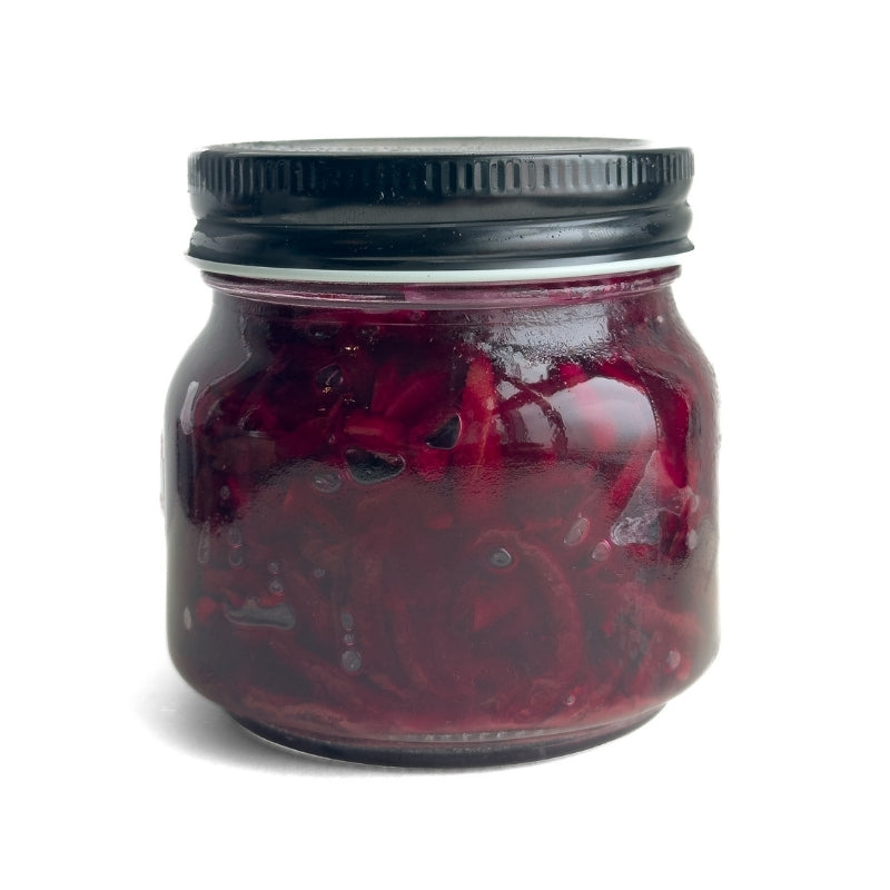 Jar of Living Lacto-Fermented Beetroot on a white background